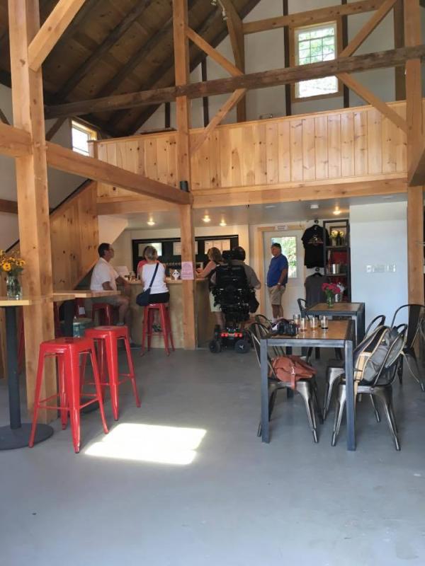 Inside the converted century-old barn that has been converted to serve as the tasting room at Lake St. George Brewing. (Photo: Jenna Lookner)