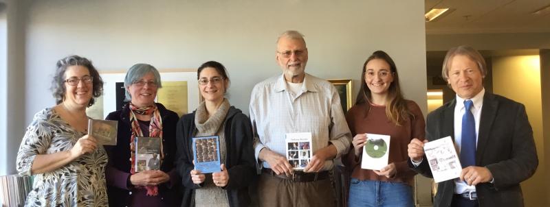 Belfast Flying Shoes board members present contra dance DVDs to Belfast Free Library staff (L to R: Chrissy Fowler, BFS secretary; Christina Barstow, BFS associate treasurer; Erica Rubin-Irish, youth services librarian; Lee Stover, BFS president; Sharon Pietryka, reference and special collections librarian, and Steve Norman, library director.)