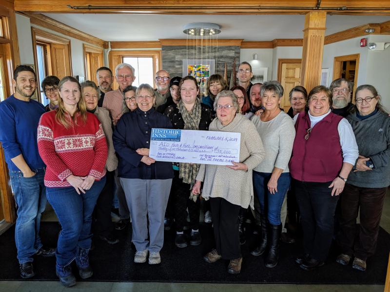 Businesses involved in the 15th Annual Pies on Parade Tour gathered at the Granite Inn in Rockland on Tuesday, February 5, 2019 to deliver a check to the AIO Food Pantry. Included in the check presentation were the following people: (pictured left to right): PJ Walter (LimeRock Inn), Laurie Schaffer (Bartlett Woods), Liz Jenkins (AIO Food Pantry), Barrie Pribyl (Bixby & Co.), Frank Isganitis (LimeRock Inn), Ted Weiss & Lisa Weiss (Hawthorn Inn), Marty Shaw (AIO Food Pantry), Pat O'Brien (FIORE Artisan Olive Oils & Vinegars), Joshua & Andrea Barbour (The Bayview Collection), Katja Hawlitschka (Towne Motel), Linda Pieper (AIO Food Pantry), Casey Cale (Cafe Miranda), Chris Seavey (Maritime Energy), Tim Matero (Maritime Energy), Peggy Bade (Auction Committee), Sharon Hobson (One Less Worry), Cheryl Michaelsen (Berry Manor Inn), Edwin Hantz & Joan Hantz (Granite Inn). (Photo by PJ Walter/PJ Walter Photography)