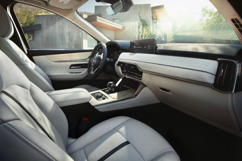 This uncluttered view of the elegant CX-90 front office is deceptive; there are no fewer than 15 small buttons on the console beneath the air vents. Fortunately, the steering-wheel switches, the push & turn infotainment controller (the large dial aft of the gear selector) and the extensive screen menu are easy to live with.