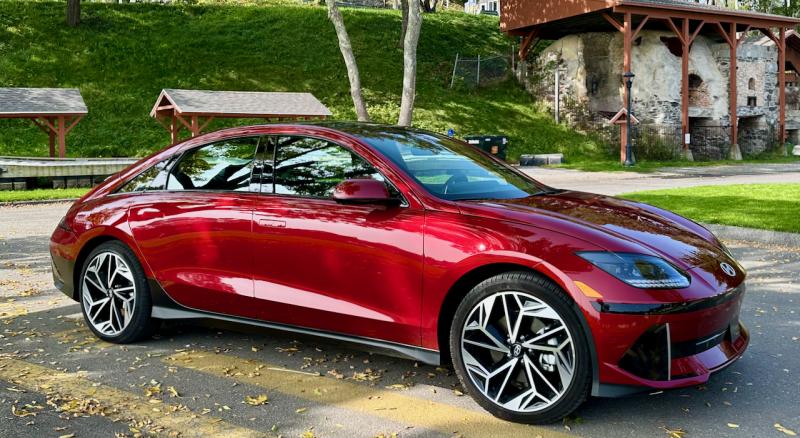 Hyundai’s Ioniq 6 electric sedan is an eye-catcher from every angle. Despite the sleek slope of the roof, there is generous space for two rear-seat passengers as well as a decent trunk.