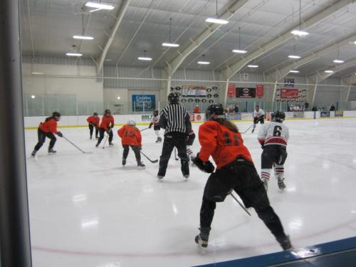 Adult hockey programs taking place on the ice