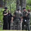 Some of the responding Knox County Sheriff’s deputies correspond with Maine Wardens at the scene. (Photo by Sarah Thompson)