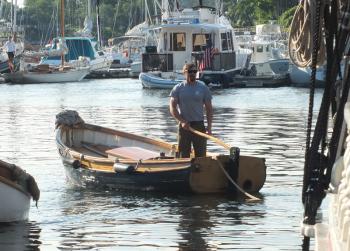 A yawl boat makes its way across Camden Harbor Saturday.