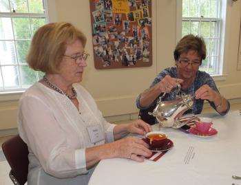 Beppy St. Andre and Doris Kilayko enjoy a cup of tea during the lecture.
