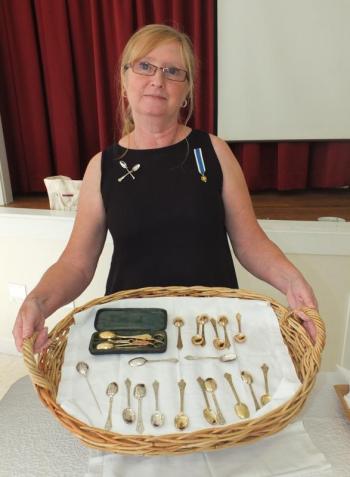 Mary Kay Fenton displaying “tea” spoons