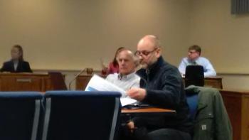 Gary Neville of Prock and Michael Sabatini of Landmark listen to the discussion.