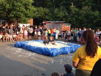 The Mashed Potato Wrestling Contest is part of the Maine Potato Blossom Festival in Fort Fairfield. (Photo courtesy Maine Potato Blossom Festival)