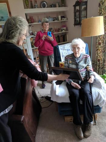 Rockport Town Clerk Linda Greenlaw presents Annie May Young Spirio with her plaque. (Photo courtesy Diane Hamilton)