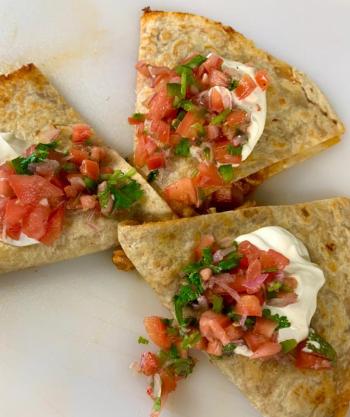 Fire-Roasted-Chili Chicken Quesadilla with homemade pico de gallo and sour cream. Photo courtesy Tai Leavitt