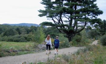 The walking trails at Erickson Fields lead into the woods and up toward Beech Hill.