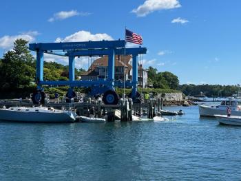 The Bandwagon, almost ready to be lifted from the water. (Photo courtesy Jesse Henry)