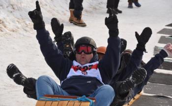 The Town of Rockport beat its sole competitor this year, the Town of Camden. The tradition of the two-town sled competition began in 2016 when two toboggans filled with four select board members from each town pitted their times against one another. That was Rockport’s 125th birthday celebration, after it had split from the Town of Camden in 1891. In 2016, Camden won the toboggan competition. This year, the Rockport toboggan was filled with Town Manager Jon Duke, Harbormaster Abbie Leonard, Finance Director Megan Brackett and Public Works crew member Kevin Grierson. They made good time down the chute, surprising everyone with the possibility of even going into the finals. (Photo by Lynda Clancy)