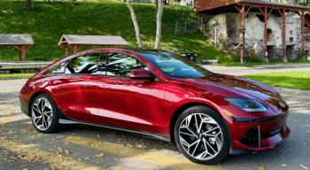 Hyundai’s Ioniq 6 electric sedan is an eye-catcher from every angle. Despite the sleek slope of the roof, there is generous space for two rear-seat passengers as well as a decent trunk.