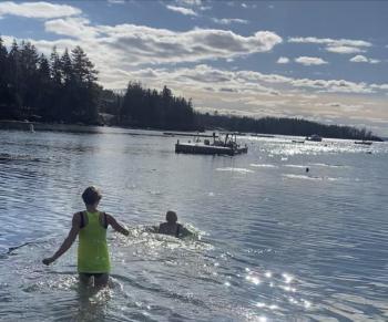 Betty Boucher and Rachel Earl of Freezing for Fun(ds) off of Big Tree Beach on Islesboro. (Photo courtesy Lisa Satchfield)