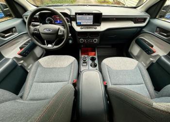 Right-sized, well-furnished and organized, the Maverick XLT cabin has everything a driver needs and nothing they do not. It is also surprisingly comfortable. note the rotary gear-selector dial and the electronic e-brake switch just below.