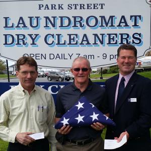 From left, Bill Flint, owner of Park Street Laundromat/Dry Cleaners in Rockland, Gary Gamage, representing The Sons of The American Legion of the Winslow-Holbrook-Merritt Post # 1 in Rockland, and Mike Hall, owner of Hall Funeral Home and Cremation Services in Thomaston, Waldoboro and Boothbay.