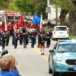 A bagpiper and a color guard lead the Memorial Day parade in Lincolnville May 29, escorted by a Maine State Police cruiser. (Photos by Holly S. Edwards)