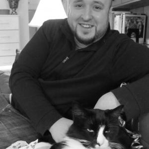 Will Braden with Henri, the cat, whose video has been seen more than a half million times.