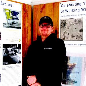 Eric Graves shows off a display at the Heritage Center at Boothbay Harbor Shipyard. ART MAYERS/Boothbay Register