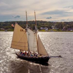 The renovated schooner Mary E sails the Kennebec River in 2019, slightly downriver from where she was launched in 1906. Courtesy of Maine Maritime Museum