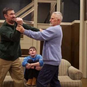 Major John (Jared Nickerson) attacks Major Jack (Andre Blanchard) while Louie (Chris Hayes) watches.(Photo courtesy Belfast Maskers)