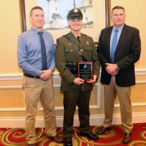 Marine Patrol Colonel Matthew Talbot (left), Marine Patrol Specialist Evan Whidden (center, and Department of Marine Resources Commissioner Patrick Keliher (right).