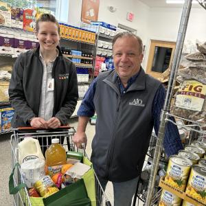 Pen Bay Medical Center and Area Interfaith Outreach Food & Energy Assistance have begun working together to make food items available within hospital practices. Pictured here, PBMC Community Health Program Coordinator Keelia Liptak-Jay (left) gathers food with AIO Food & Energy Assistance Executive Director Joe Ryan. (Photo courtesy Pen Bay Medical Center)
