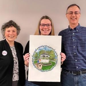 Alyssa Willey of Warren, center, with her winning logo for Union, Maine’s 250th anniversary, with Argy Nestor, left, and Keith Siegel, right, co-chairs of the Union Sestercentennial Committee.