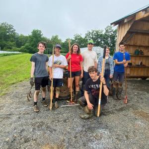 The 2023 at Erickson Fields Preserve. Left to right: Cole Thompson (Teen Ag Crew Leader), Charlie Moss (Teen Ag Crew Leader), Nina Miller (MOFGA Apprentice), Aidan deLorimer (Teen Ag Crew Leader), Jaden Johnson (Teen Ag Intern), Kayne Legasse (Teen Ag Intern). Front: Oliver Wight (Teen Ag Intern). (Photo courtesy Maine Coast Heritage Trust)