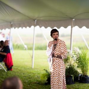 Trekkers Executive Director Amie Hutchison speaks to attendees at the Fired Up Fundraising event in 2021. (Photo courtesy Trekkers)
