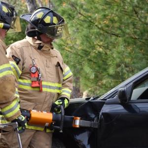 Area firefighters work together during an extrication demonstration in St. George. (Photo by Sarah Thompson)
