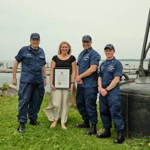 (R- L) USCG Station Commanding Officer Jason Latiolais, XPO BMC Thomas Moen, Rockland Mayor Nicole L. Kalloch, and Auxiliarist Paul Ljunggren. (Photo by David Troup)