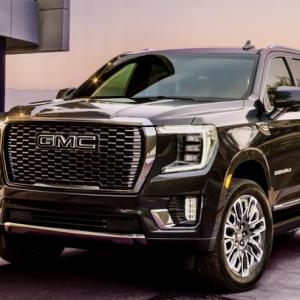 Imposing as the Yukon Denali is, thanks to a well-calibrated suspension and controls, plus a 360-degree protection zone of sensors, alerts and cameras, it drives much smaller than might be expected. This color is Titanium Rush Metallic.
