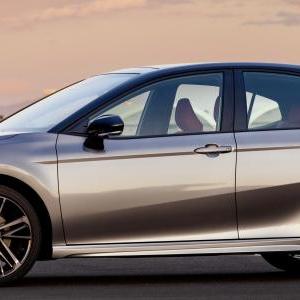 A soul-less appliance to enthusiasts and a beloved family car to drivers looking for comfortable, headache-free transportation, the Camry has been around since 1982. The hybrid-only ninth generation may be the best, and is surely the best-looking, one yet. This color scheme is Heavy Metal with Midnight Black Metallic.