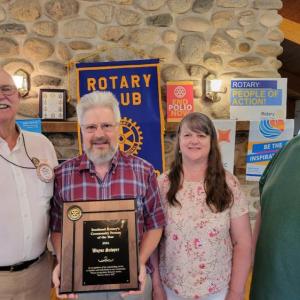 Rockland Rotary president Mike Flanagan; Wayne Sawyer and wife, Meg Sawyer; and Rockland Rotarian, Jeff Boutaugh. (Photo courtesy Rockland Rotary)