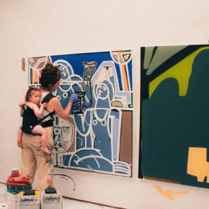 America Martin painting with daughter Mosie 2024. (Photo courtesy Carver Hill Gallery)