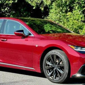 The flagship of the Lexus fleet, the LS500 is long, low, sleek and luxurious; it does a fine job of keeping the outside world . . . outside. F Sport trim includes these wrap-around radiator grilles, special badges and 20-inch Gloss Black Metallic wheels. This color is Matador Red Metallic.